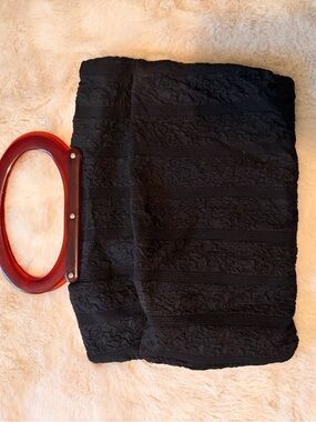 Vintage Black Textured Tote Bag with Red Oval Handles